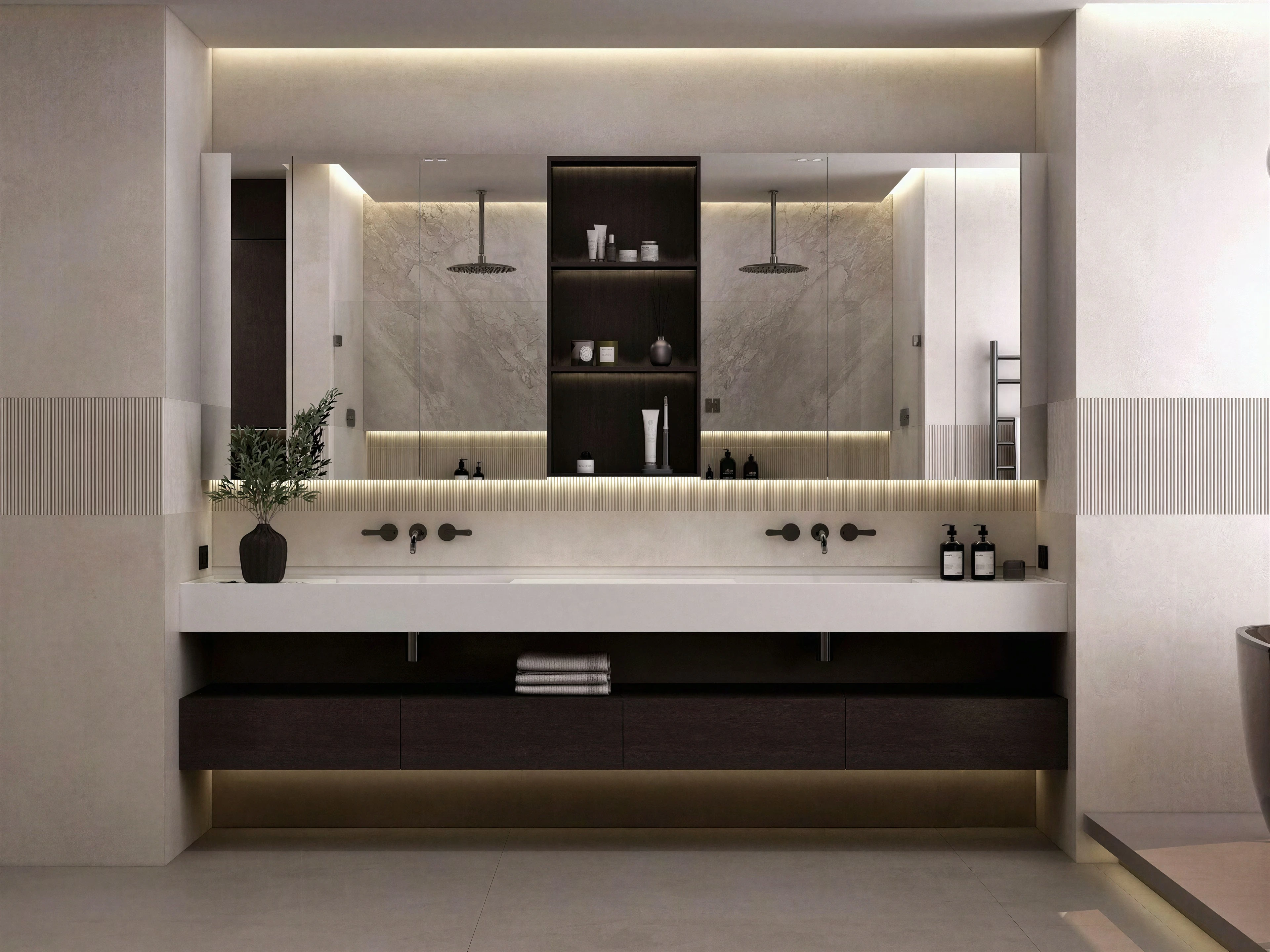 Double bathroom vanity beneath illuminated mirrors.